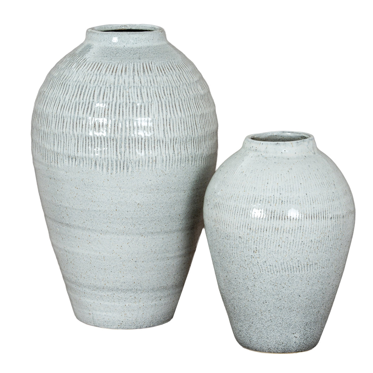 Kemi Medium Olpe Vase at right beside the larger coordinating white ceramic vase