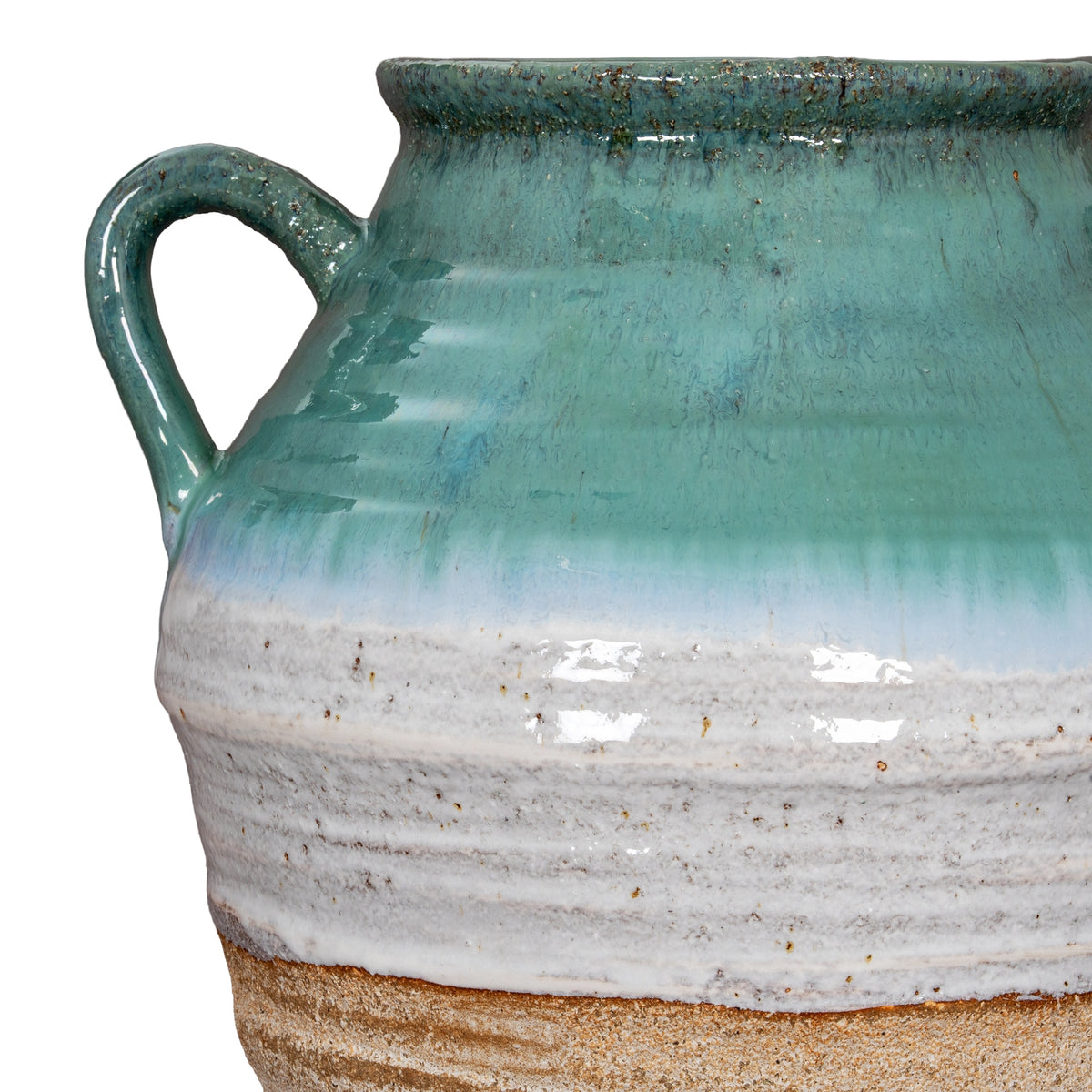 Close-up of a curved handle and layered green-white glaze on the Fen Amphora Vase