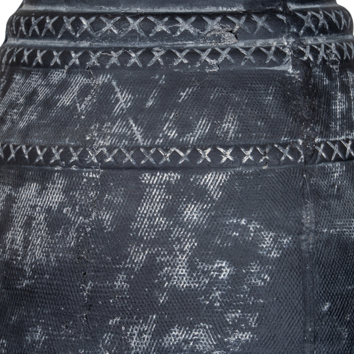 Detail of the pale etched surface marks on the black Etched Collection Tall Vase