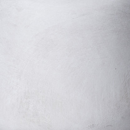 Close-up of the pale stone-effect ceramic texture on the Darcy Ople Vase