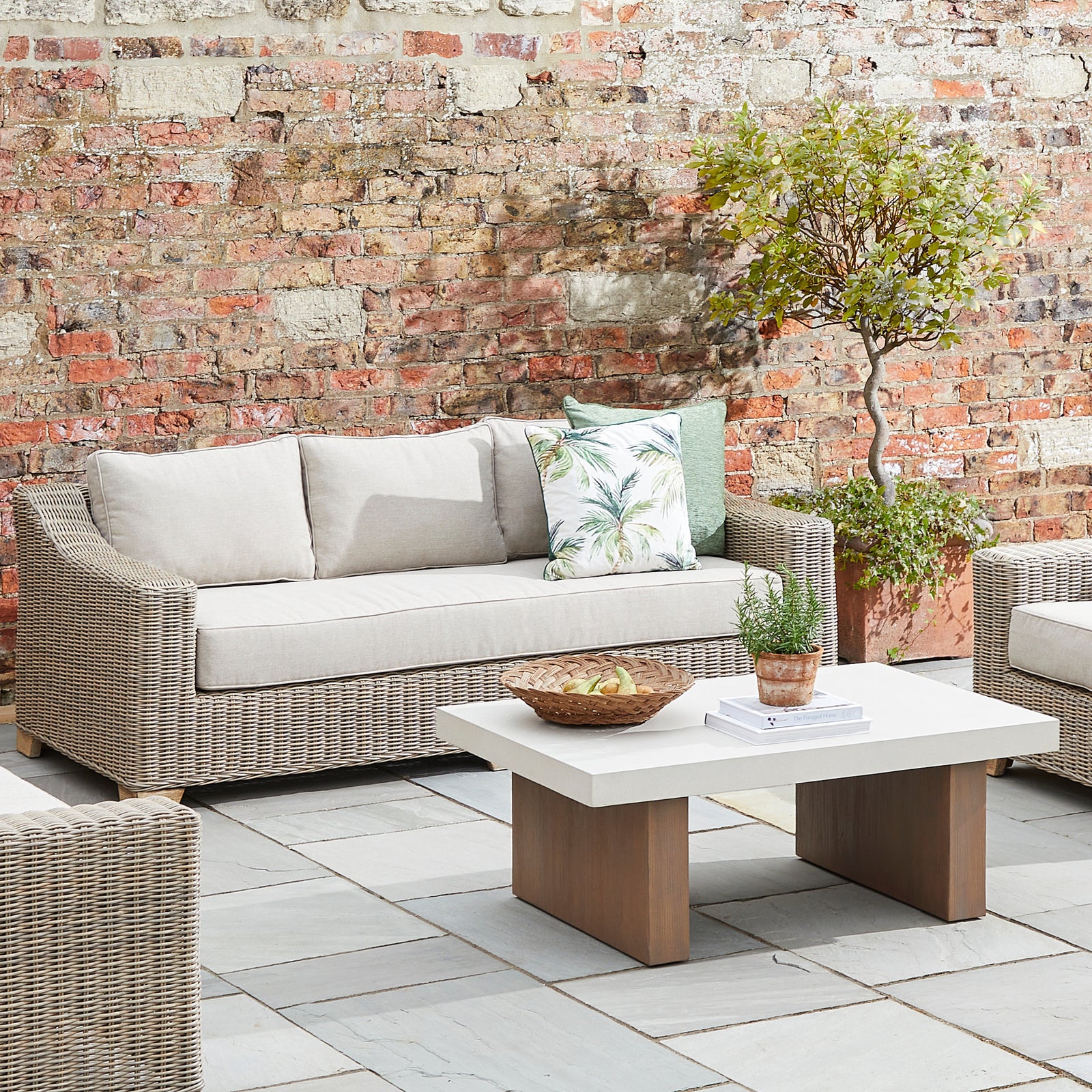 Capri Collection outdoor three seater rattan sofa with cream cushions, weather-resistant wicker garden furniture, patio lounge set