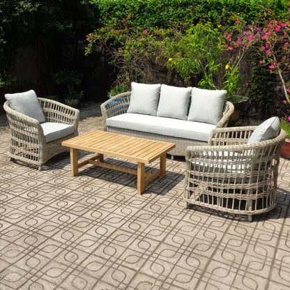 Outdoor patio set with wicker chairs, sofa, and table 