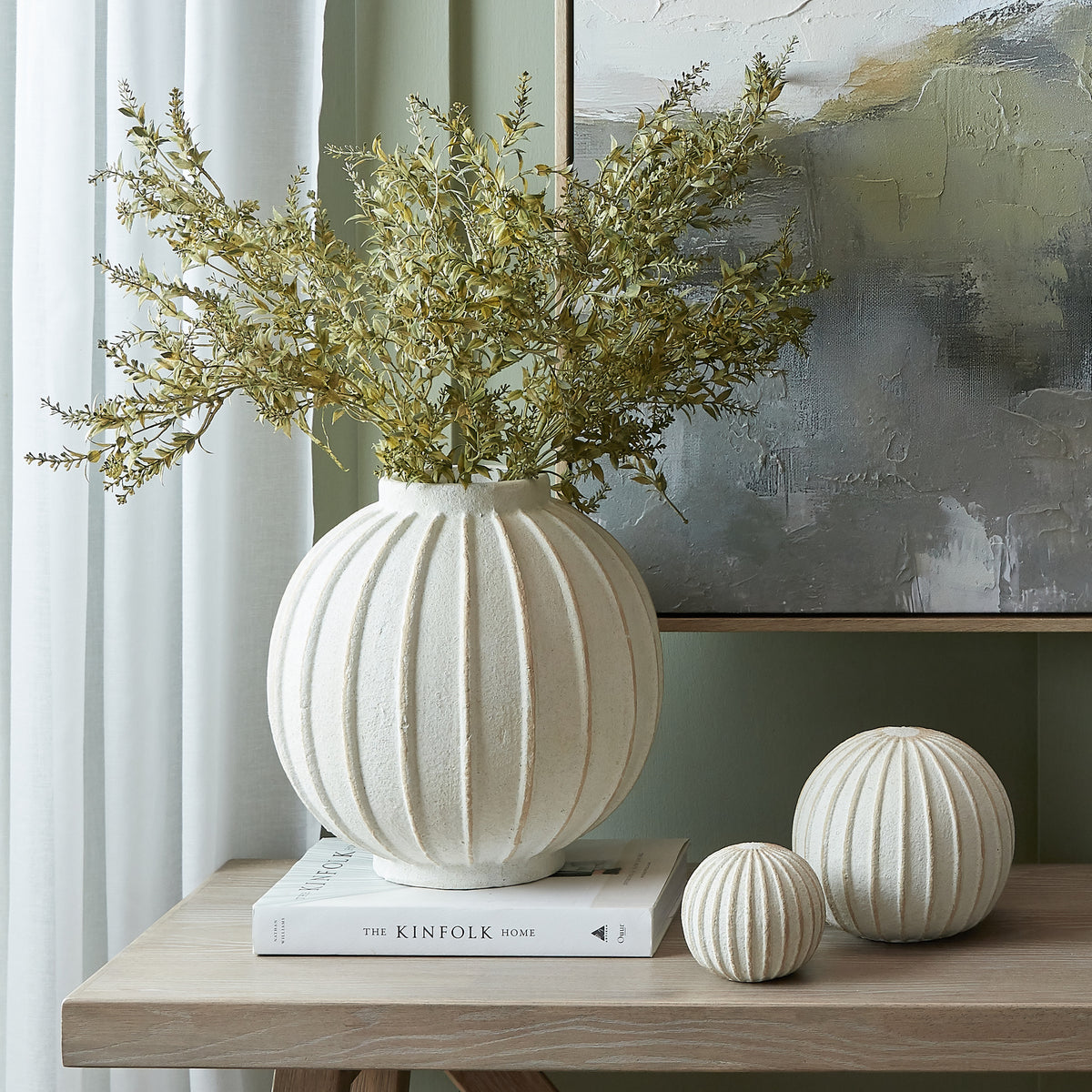 Grove Large Globe Vase in a styled neutral interior with coordinating accessories