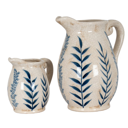 Large Blue Flora Olpe Jug Vase at right beside the smaller matching jug vase