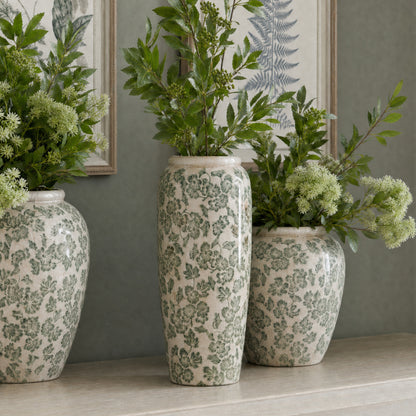 Large Green Clover Tall Olpe Vase with green floral clover pattern, styled with eucalyptus on a mantelpiece, tall ceramic flower vase UK