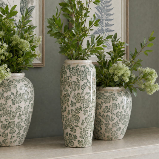 Large Green Clover Tall Olpe Vase with green floral clover pattern, styled with eucalyptus on a mantelpiece, tall ceramic flower vase UK