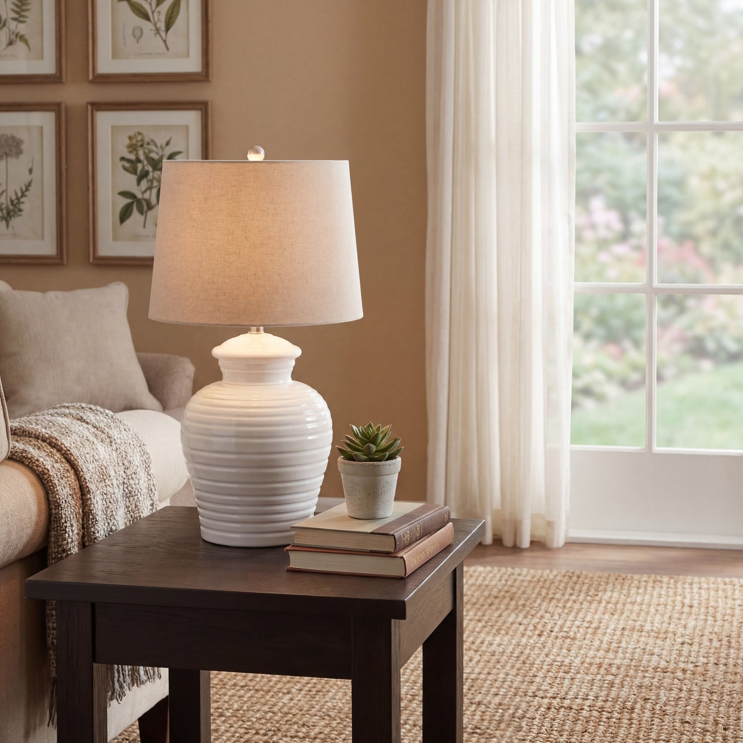 white ceramic pot lamp, with intricate ribbing and a linen shade. Xquisite by Design UK